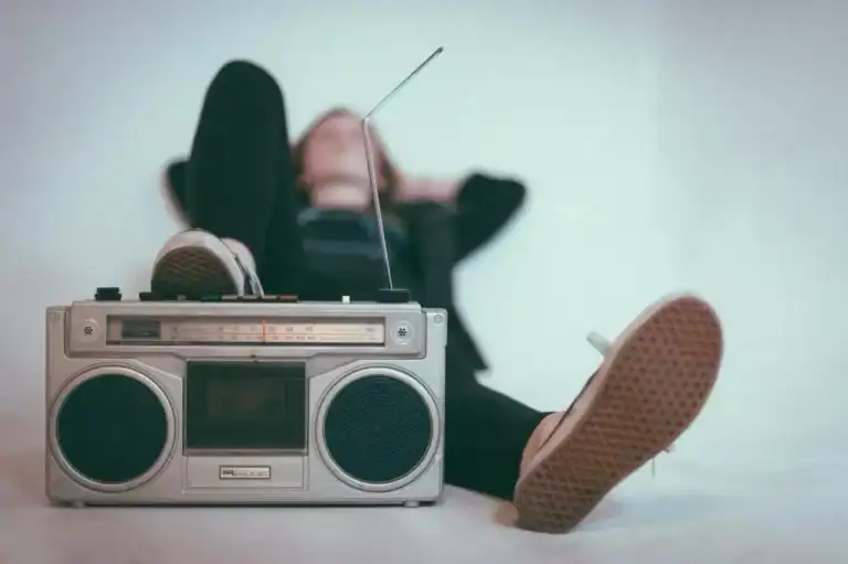 image of relaxed girl listening to the music for ketamine infusions
