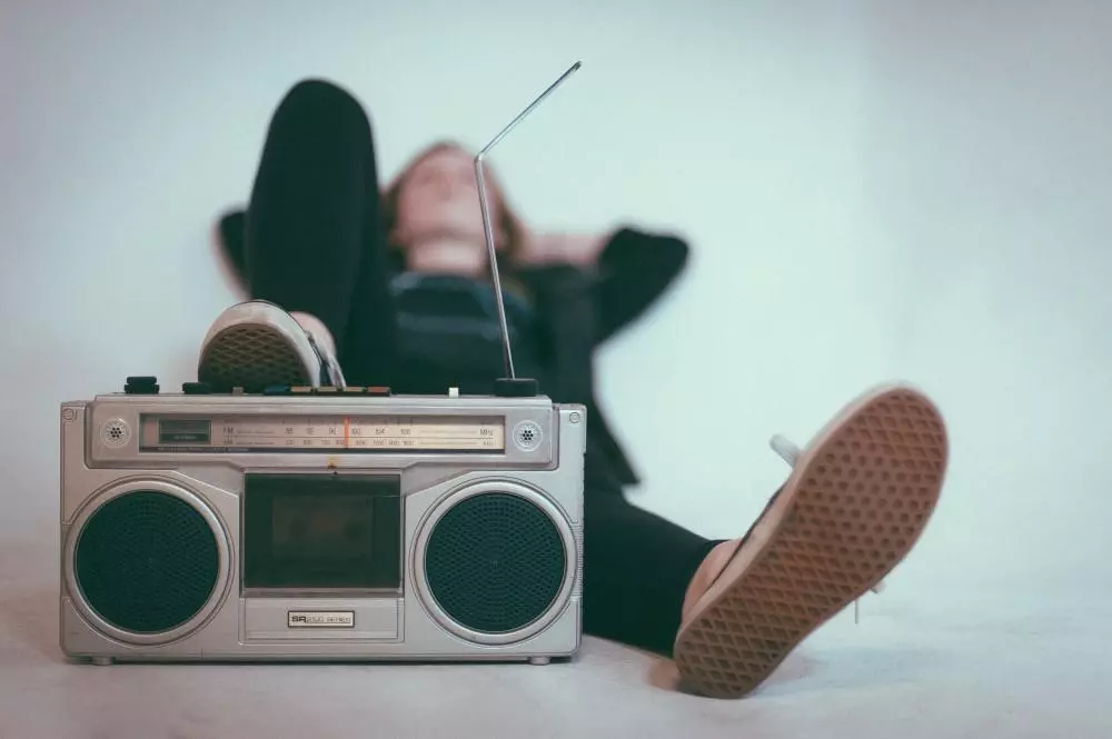 image of relaxed girl listening to the radio