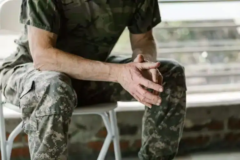 image of a seated veteran considering ketamine therapy