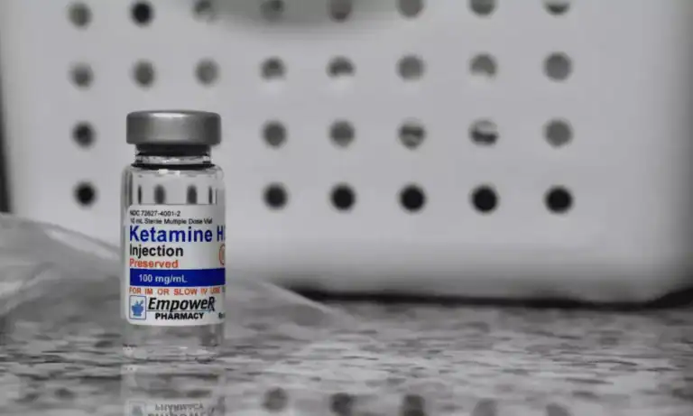 image of ketamine bottle used to treat depression, anxiety, ptsd, chronic pain, and mental health disorders