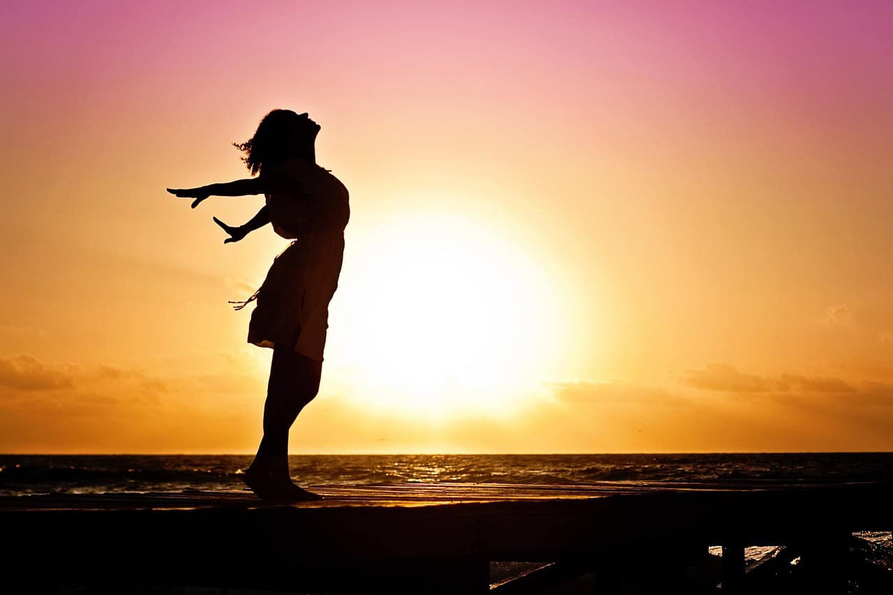 image of confident woman on the beach, self-confident after ketamine infusions helped
