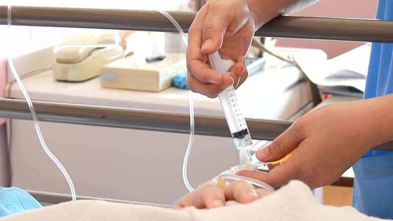Hd 1080p : close up injection medicine through the saline solution.