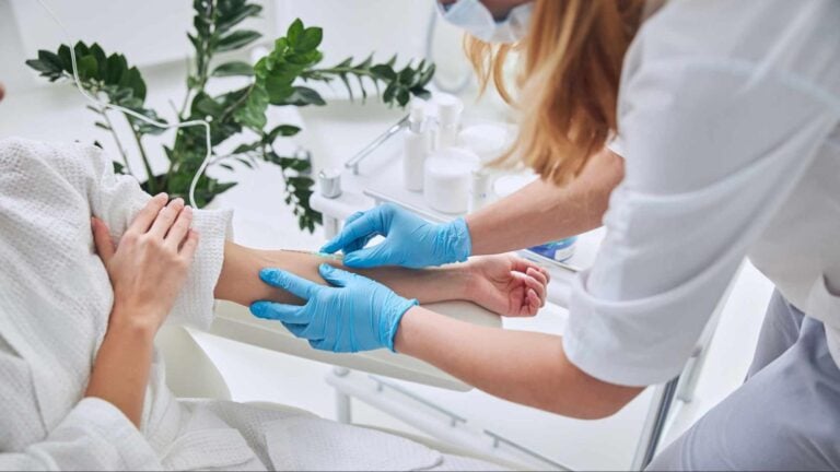 image of nurse administering ketamine infusion in virginia