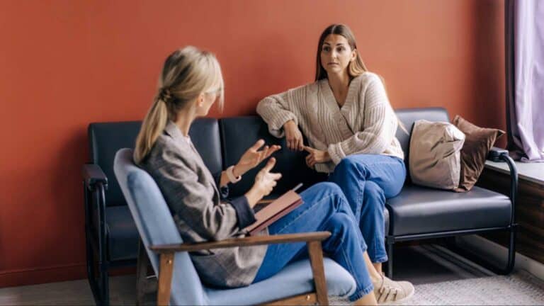 woman discussing depression and ketamine infusions with her therapist