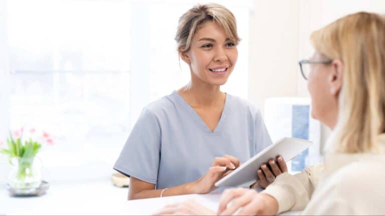 two women talking about insurance options for ketamine infusion therapy in Maryland